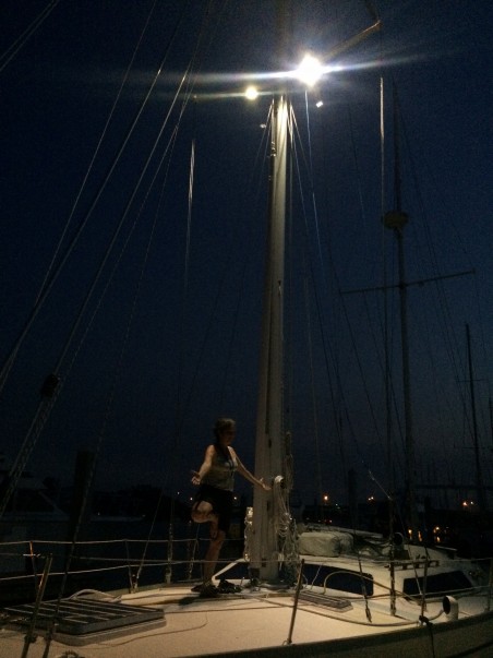 The mast is up, yoga under the lights. 