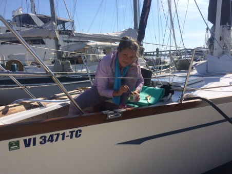 Sealing our teak "toe rail" for a pretty special needs sailboat